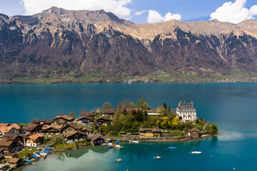 Aerial view of the famous Iseltwald village on the shores of lake Brienz near Interlaken in Canton...