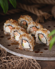 Asian rolls on brown background