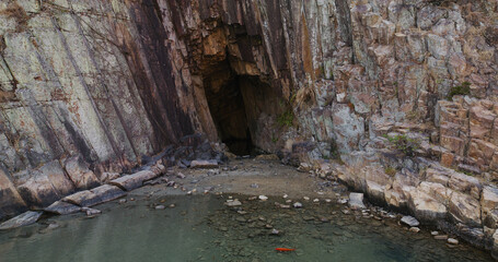 Sea cave with koi fish in Hong Kong Geopark