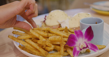 French fries on plate in restaurant