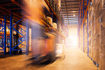 Blur Motion of Workers Driving Forklift Unloading Cargo Pallets in The Warehouse. Shipping Warehouse. Delivery Service Shipment Boxes. Supply Chain Goods. Warehouse Cargo Logistics Transport.	 - Powered by Adobe