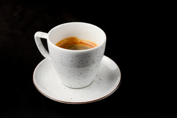 Coffee espresso over black background. Coffeee time, isolated on black.