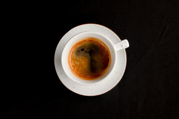 Coffee espresso over black background. Coffeee time, isolated on black.