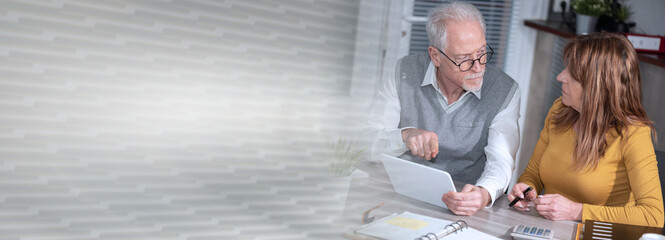 Mature business people working together; panoramic banner