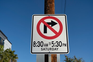 No right turn traffic sign with time and date
