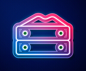 Glowing neon line Bag of flour icon isolated on blue background. Vector