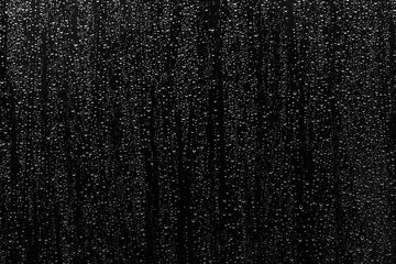 Rain drop background texture over glass surface - 423661652