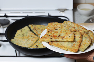 Onion cheese cakes. Homemade cheese, green onions and bacon flatbread.