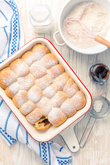 Sweet rolls, Buchteln filled with plum jam or jelly