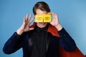 Super man in a red cape sleeps at work, sleep problems with stress at work, concept.