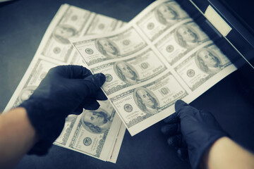 The concept of the global economic crisis. Illegal production of US dollars. Print money...