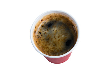 Coffee in a red paper cup on a white background close up view from the top.