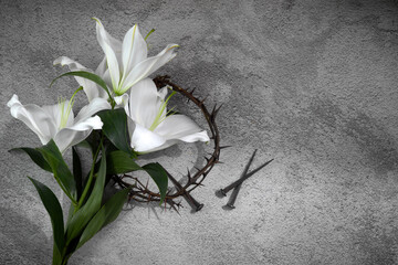 Good Friday, Passion of Jesus Christ. Crown of thorns, nails and white lily. Christian Easter...