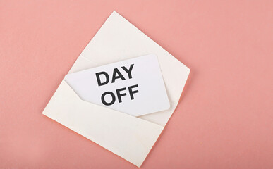 Word Writing Text DAY OFF on card on the pink background