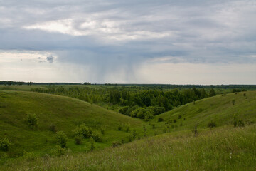 a rain cloud in a field