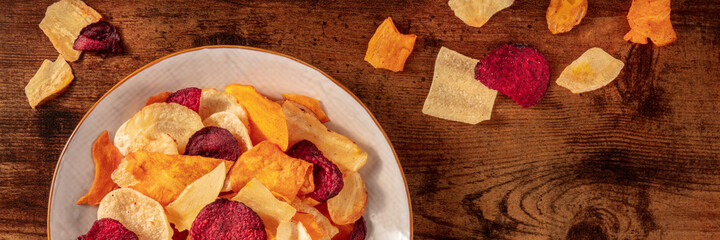 Vegetable chips panorama with copy space