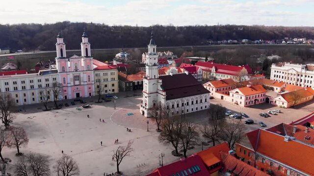 aerial shot in Kaunas. drone flies around the Kauno rotuse. circling around the church. Kaunas old town in sunny day.