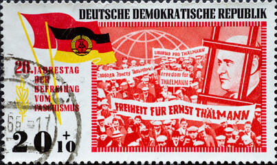 a postage stamp from Germany, GDR showing a demonstration for the release of the revolutionary...