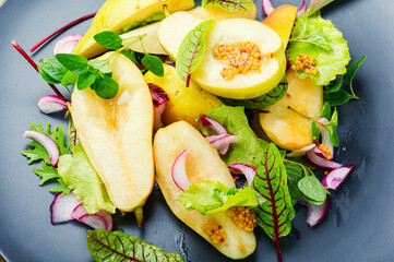 Autumn salad with pear.