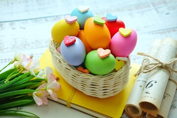 Close up of Colorful Easter Eggs on white wooden background.