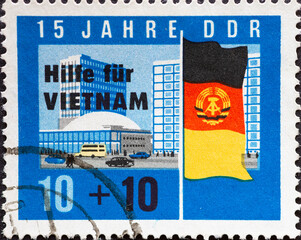 GERMANY, DDR - CIRCA 1965  : a postage stamp from Germany, GDR showing a postage stamp with a GDR...
