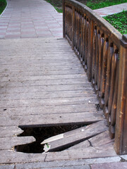 broken bridge in the park in spring