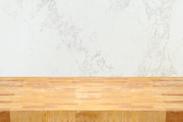 Empty wooden table  over marble wall background. Kitchen counter top for mock up design