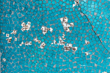 Old white mosaic wall with hole and rust, background from old mosaic.