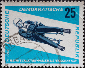 GERMANY, DDR - CIRCA 1966  : a postage stamp from Germany, GDR showing an athlete on the men's...