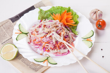 vegetables on a plate with a fork