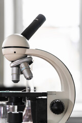 Professional microscope on a workplace in a laboratory