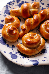 Homemade fresh baked traditional Czech sweet buns called Juda's ropes or Jidáše in Czech