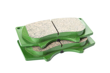 New brake pads on white background isolated object