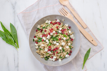 healthy spring salad with asparagus, barley and cheese