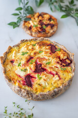 Fresh homemade tart with feta cheese and beetroot