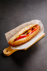 hot dog on a dark background
