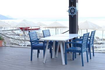 Coastal cafe interior without people, season without tourists