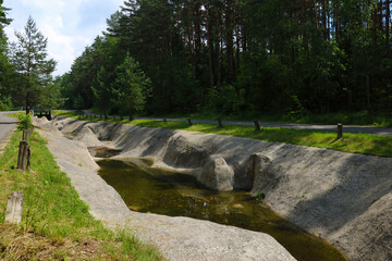 An empty artificial canal without water for sports.