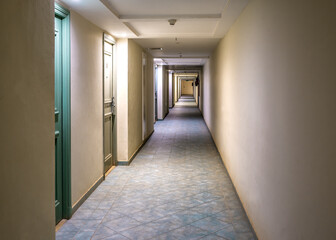 lighted corridor with doors