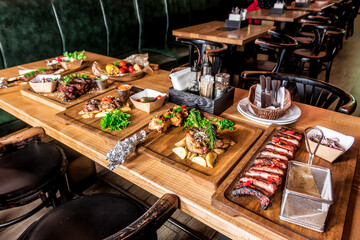 table with various meat dishes