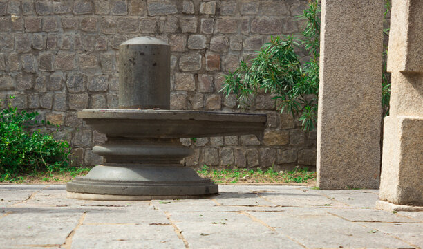 A Divine picture of a sacred Shiva Lingam  in a conical shape made in stone material usually found in all  Hindu temples across India.