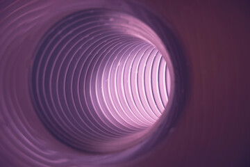Beautiful round abstract pink tunnel with color light on a background pattern textured ford design.