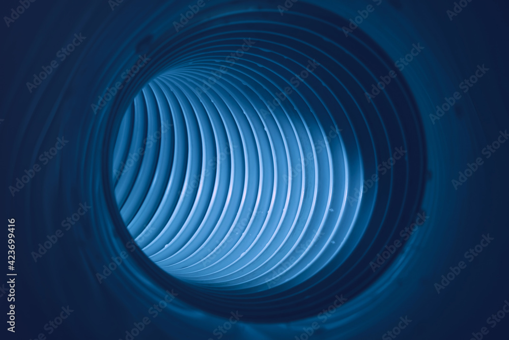 Poster Beautiful round abstract blue tunnel with color light on a background pattern textured ford design.