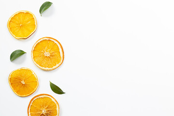 Slice orange fruit isolated on white background. flat lay, top view, copy space