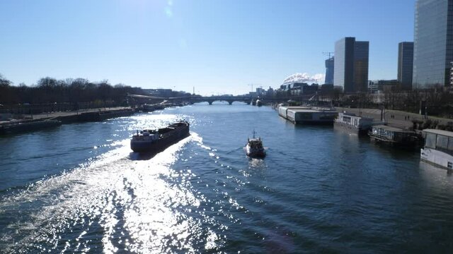 The Seine river from the parisian bridge of Bercy during a sunny day. March 6th 2021, Paris, France