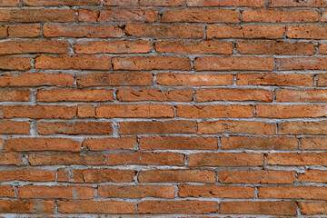 Obraz premium Brick wall with red brick background.