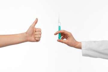 medicine, vaccination and healthcare concept - hand of doctor with syringe and patient showing thumbs up over white background