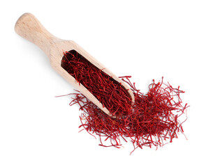 Dried saffron and wooden scoop on white background, top view