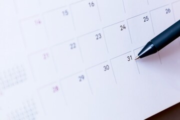 The date number 31 on calendar with black pen for mark the end of month.