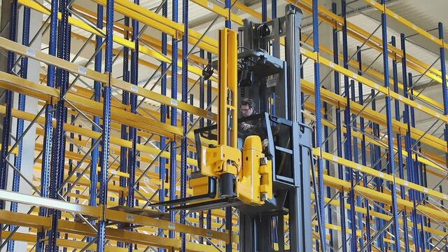 Forklift High Rack Stacker in New Distribution Warehouse